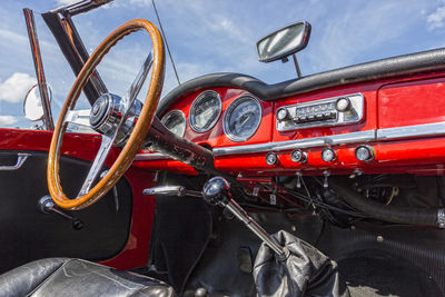 Red car against sky