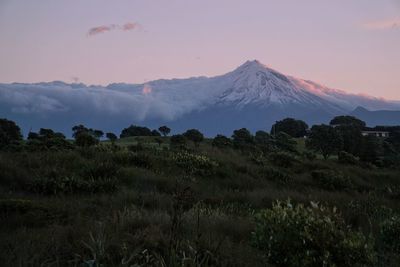 Scenic view of mountains against sky during sunset