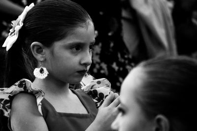 Close-up of people looking away while dancing during festival