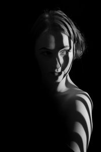 Close-up of woman in darkroom