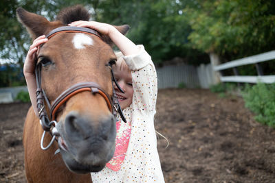 Horse standing on field