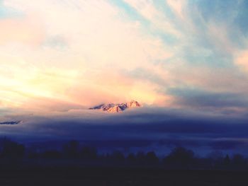 Silhouette of water against sky during sunset