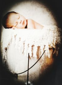 Close-up portrait of baby girl sleeping