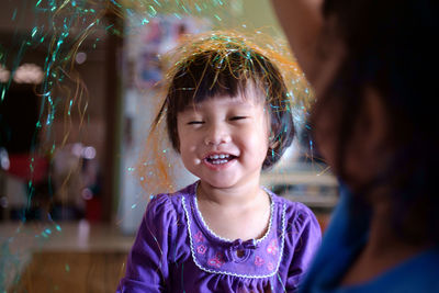 Close-up of girl smiling