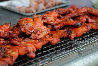 Close-up of meat on barbecue grill