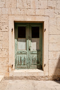 Closed door of old mediterranean building