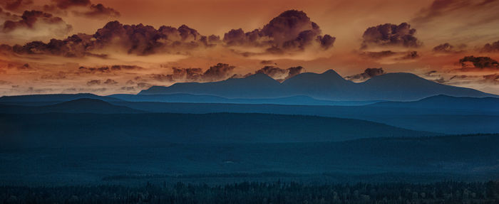 Aerial view of landscape against dramatic sky