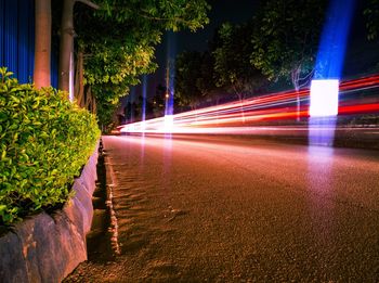 Light trails on street in city at night