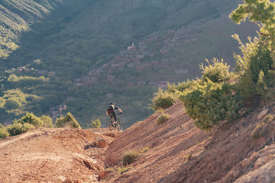 Man riding motorcycle on mountain