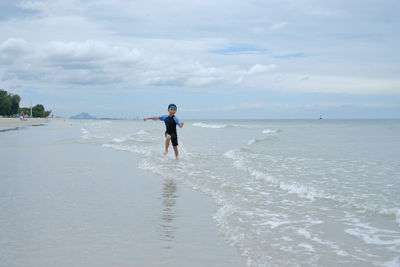 Children playing at beach in thailand beach pattaya huahin phuket