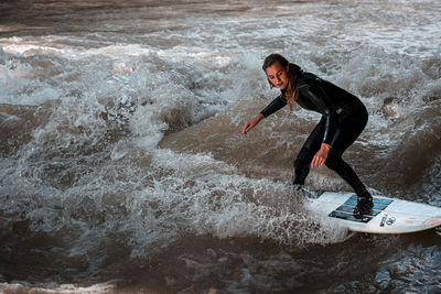 Full length of person in sea during winter