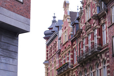 Low angle view of buildings against clear sky