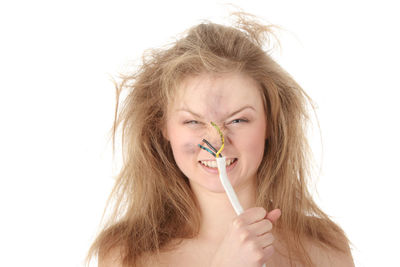 Portrait of a beautiful young woman over white background