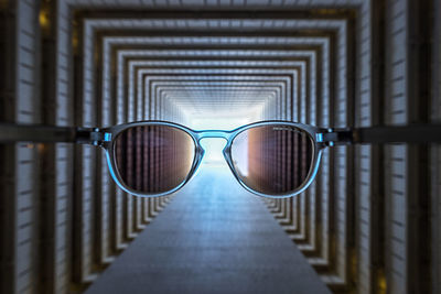 Blurred motion of tunnel seen through sunglasses