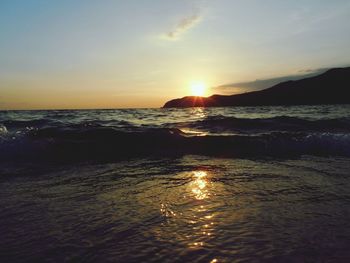 Scenic view of sea against sky during sunset