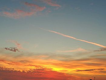 Scenic view of dramatic sky during sunset