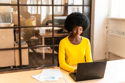 Man using laptop on table