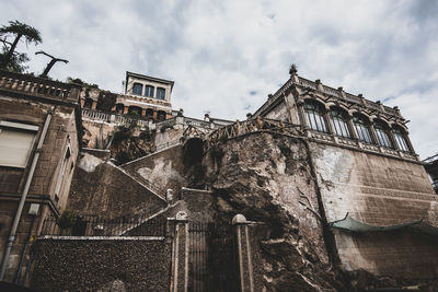 Low angle view of old building against sky