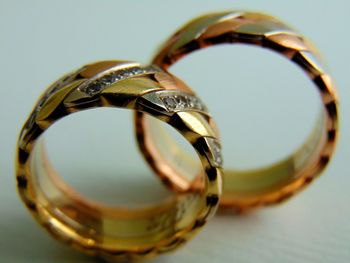 Close-up of wedding rings on table