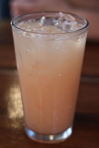 Close-up of ice tea in glass on table