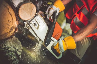 High angle view of man working at machine