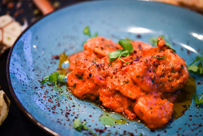 High angle view of meat in plate on table