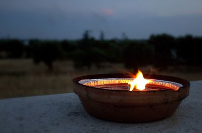 Close-up of lit candle