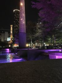 Illuminated city lit up at night