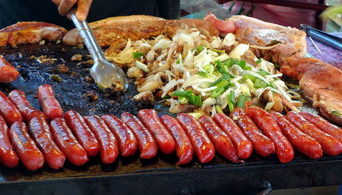 Close-up of meat on barbecue grill