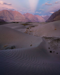 Scenic view of desert against sky