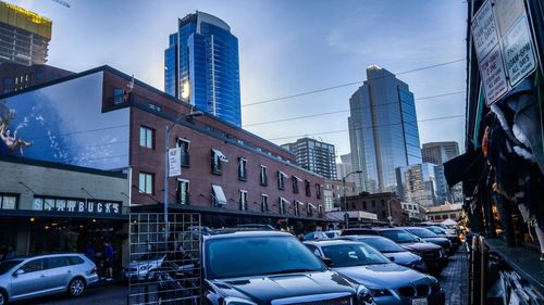 Modern buildings in city against sky