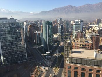 High angle view of buildings in city against sky