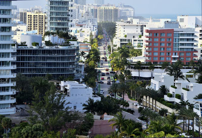 High angle view of buildings in city against sky