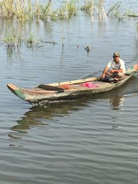 Man sitting in lake