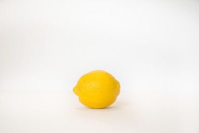 Close-up of fruits against white background