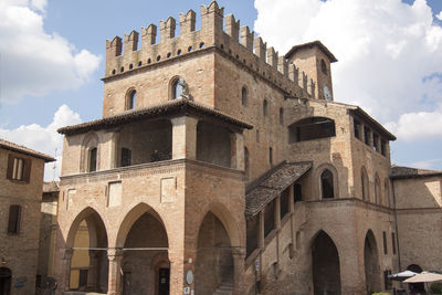 Low angle view of historic building against sky