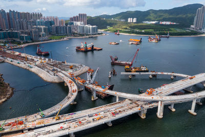 High angle view of boats in city