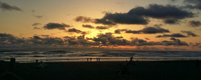 Scenic view of sea at sunset