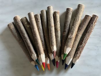 High angle view of colored pencils on table