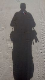 Rear view of a silhouette woman shadow