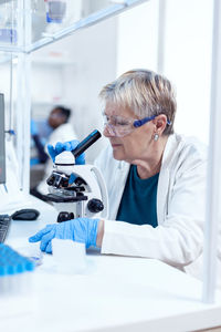 Doctor examining patient in clinic