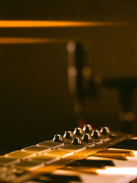 Close-up of illuminated lighting equipment on table