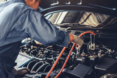 Man working in car