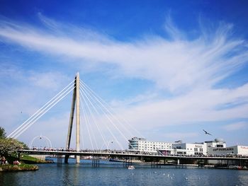 Bridge over sea against sky