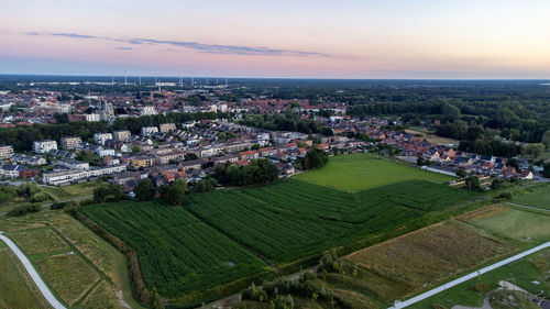 High angle view of townscape against sky during sunset