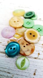 Close-up of multi colored candies on table