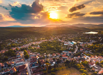High angle view of townscape against sky during sunset