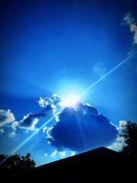 Low angle view of vapor trails in sky