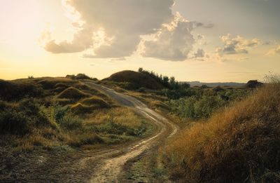 Scenic view of landscape against sky during sunset