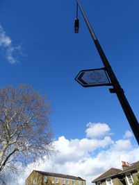 Low angle view of building against blue sky